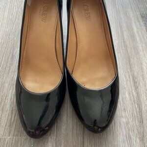 Black patent leather wedges